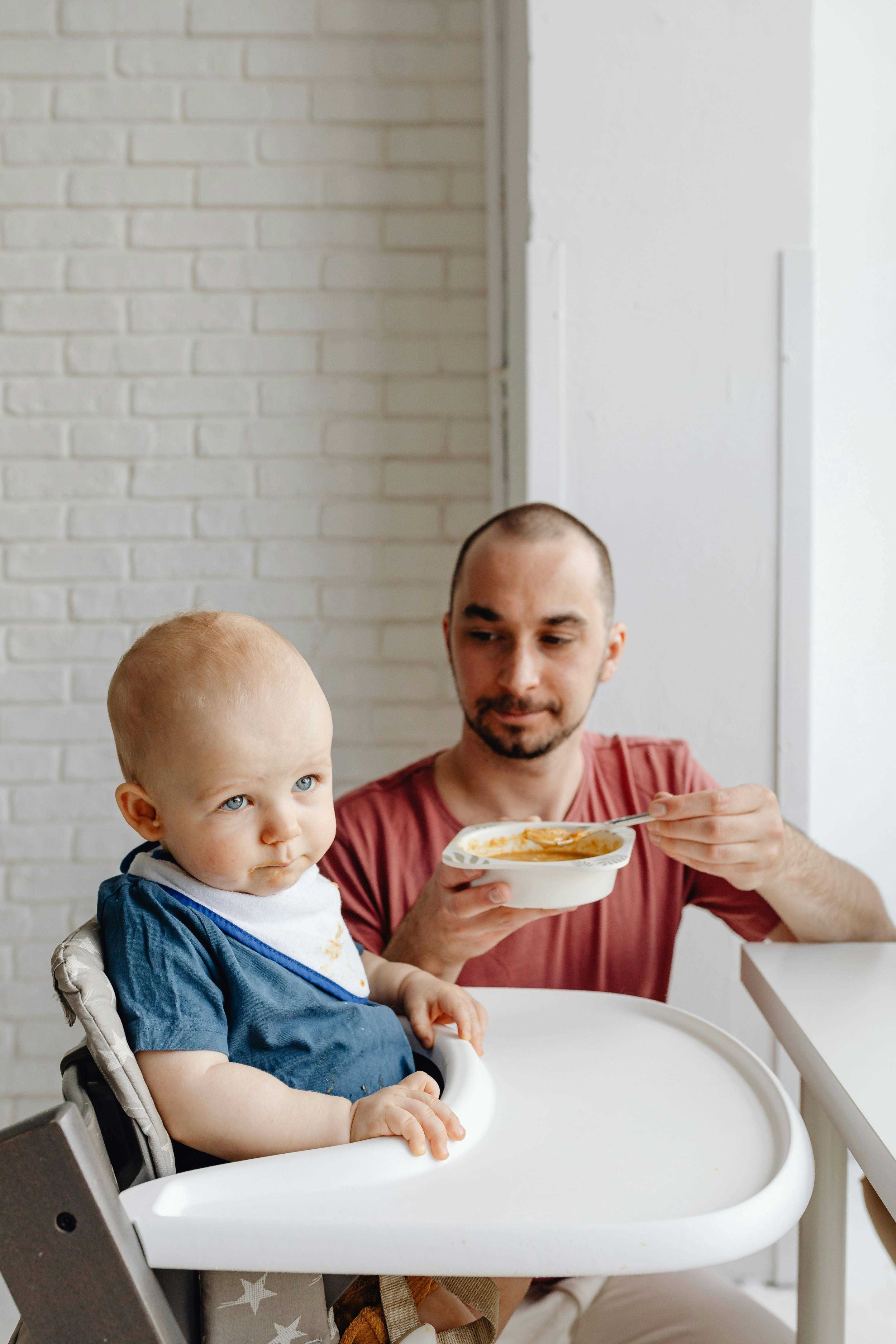 How can I encourage my baby to try new foods and manage picky eating habits?